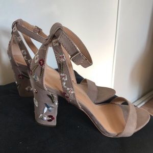 Tan heels with flower stitched design